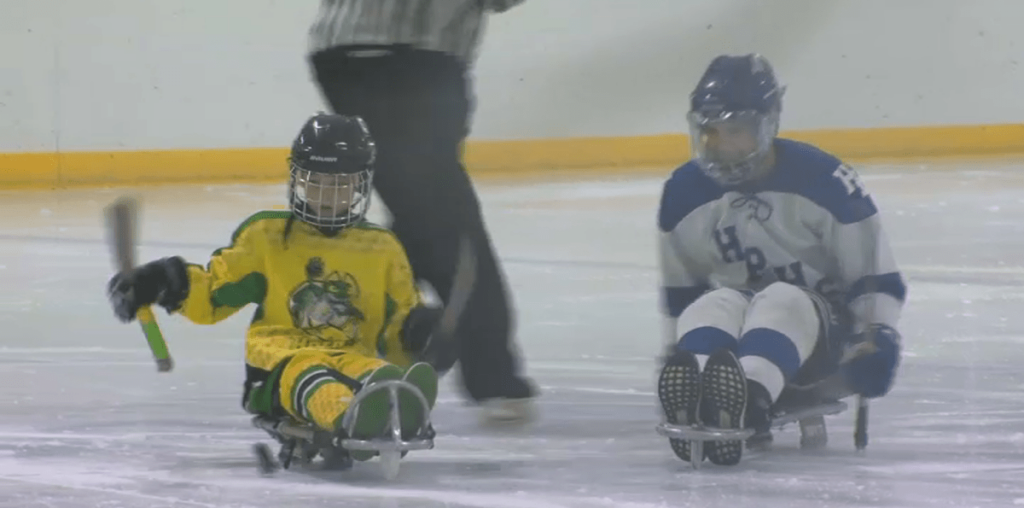 10-year-old paralyzed in Highland Park shooting finds new passion in Sled Hockey