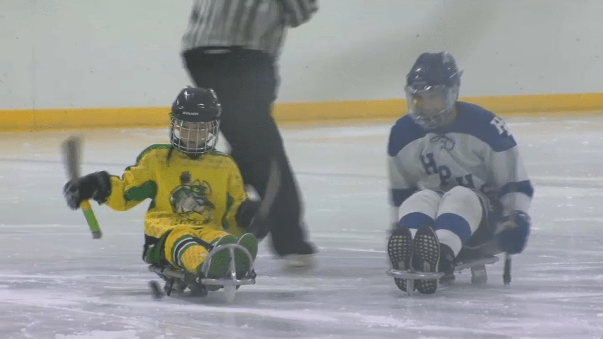 10-year-old paralyzed in Highland Park shooting finds new passion in Sled Hockey