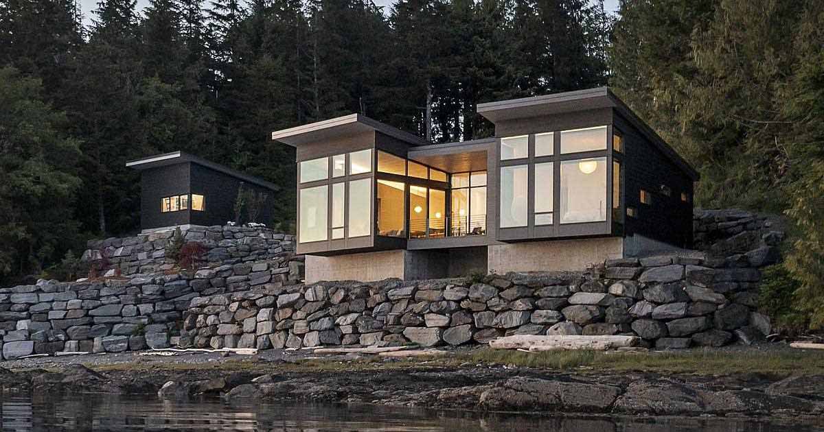 A New Home Overhanging The Water’s Edge In Alaska