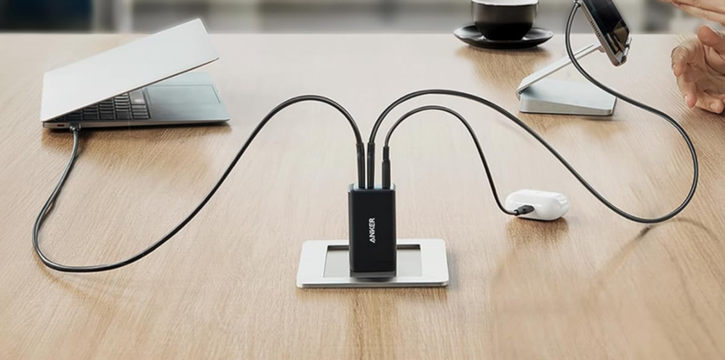 Anker 735 charger plugged into many devices