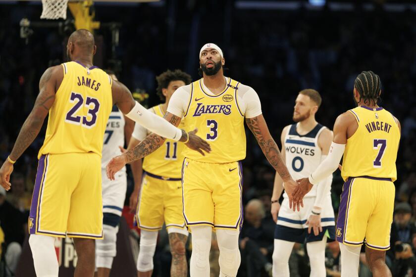 Anthony Davis dominates opener as Lakers’ offense runs through him