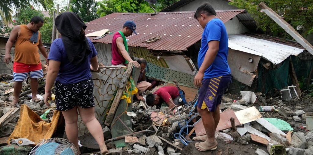 At least 126 dead and missing in massive flooding and landslides in Philippines