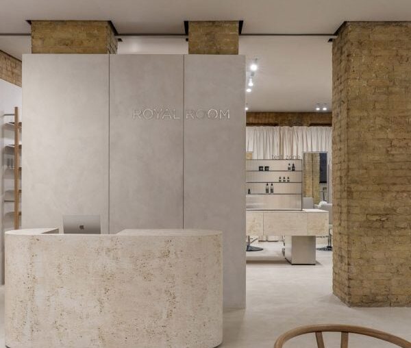 Bude Architects uncovers historic clay bricks for Kyiv cosmetics showroom