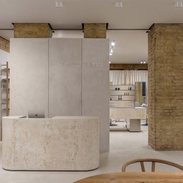 Bude Architects uncovers historic clay bricks for Kyiv cosmetics showroom