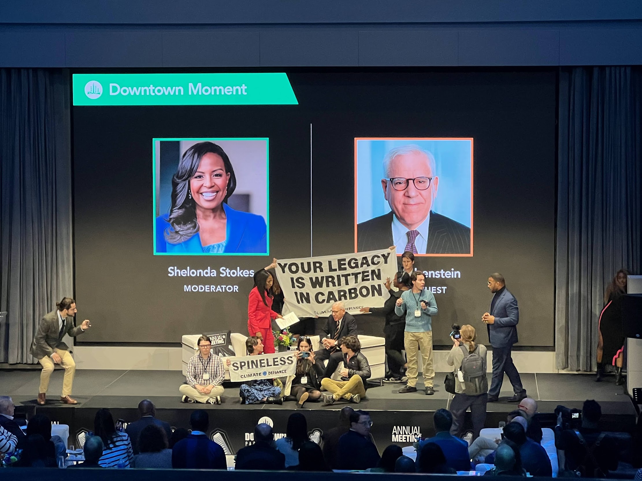 Climate protesters interrupt Orioles owner at Baltimore summit