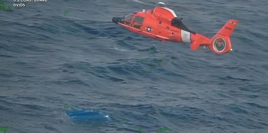 Father and sons rescued after boat capsizes seven miles off Hawaii coast