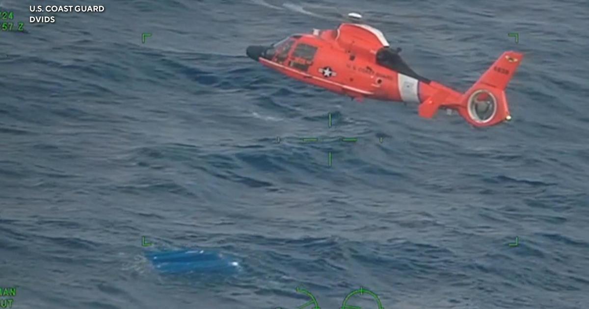 Father and sons rescued after boat capsizes seven miles off Hawaii coast