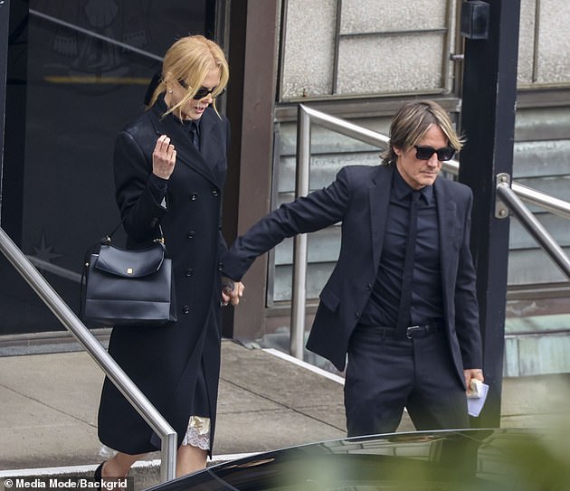 Grief-stricken Nicole Kidman is comforted by her husband Keith Urban at her mother Janelle’s funeral as their daughter Sunday Rose breaks down in tears