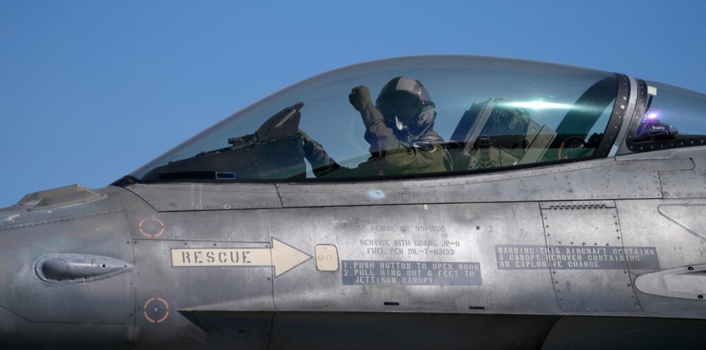 The pilot of a Greek Fighter Jet F-16 Viper salutes prior to takeoff.