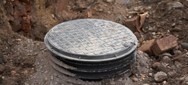 How to Remove a Septic Tank Lid | DoItYourself.com