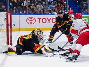 Hurricanes 4, Canucks 3 (OT): Spirited rally falls short as PP falters