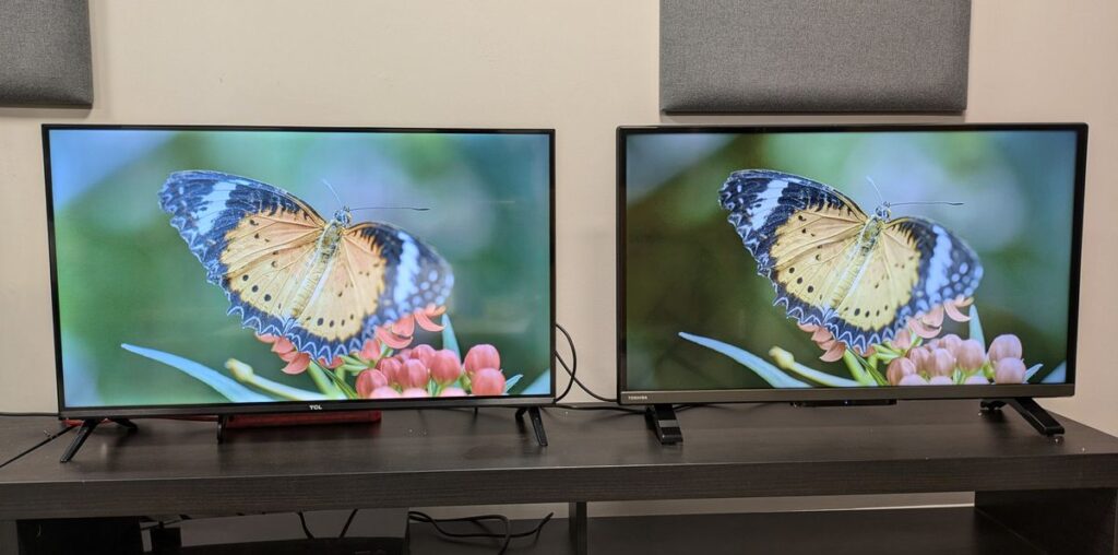 TCL S5400 and Toshiba LF2F53DB side by side with butterfly on screen