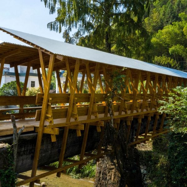 IARA piggybacks stone aqueduct with sheltered timber bridge in China