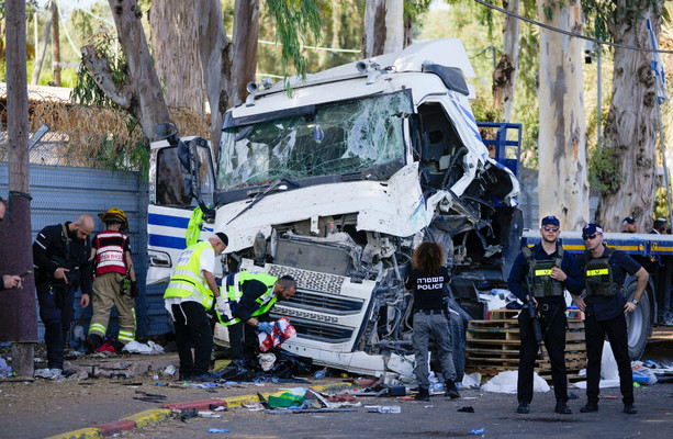 Israel says at least 24 injured after truck rams bus stop