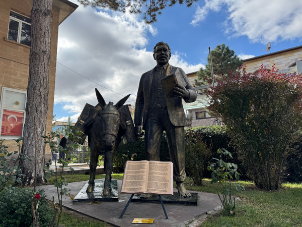 Librarian with the Donkey Monument