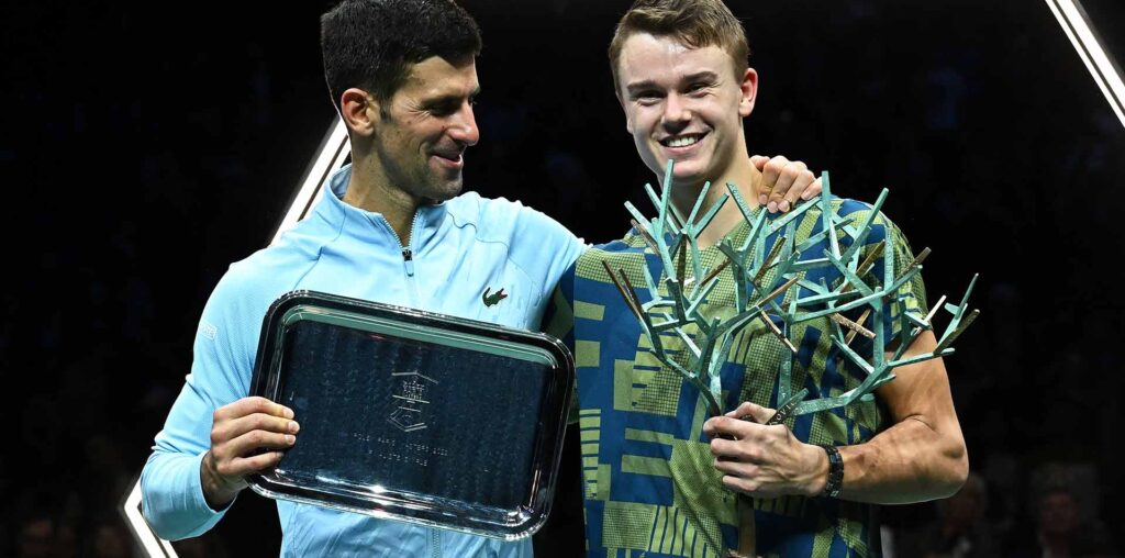 Novak Djokovic congratulates Holger Rune on his first ATP Masters 1000 title in Paris.