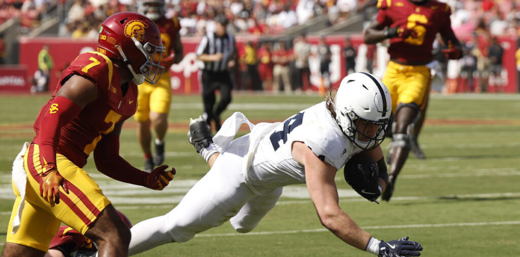 Penn State's Tyler Warren snaps the ball and catches a TD pass on the same play vs. USC