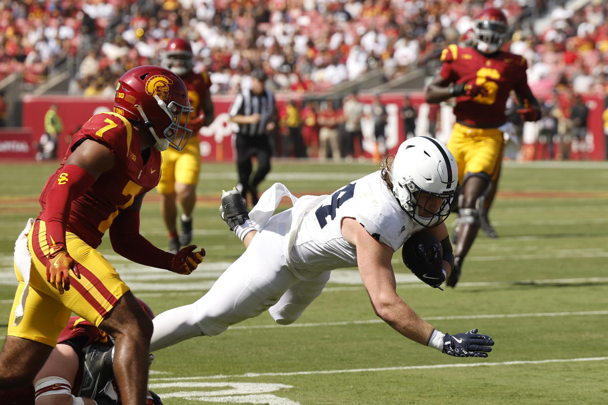 Penn State’s Tyler Warren snaps the ball and catches a TD pass on the same play vs. USC