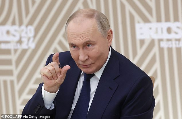 Putin sends defiant message to the West as he gathers world leaders for BRICS summit to show sanctions aren’t working (but cracks are showing between his most powerful ‘allies’)