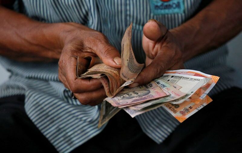 Rupee pegged back by higher US yields; hopes of RBI intervention counters