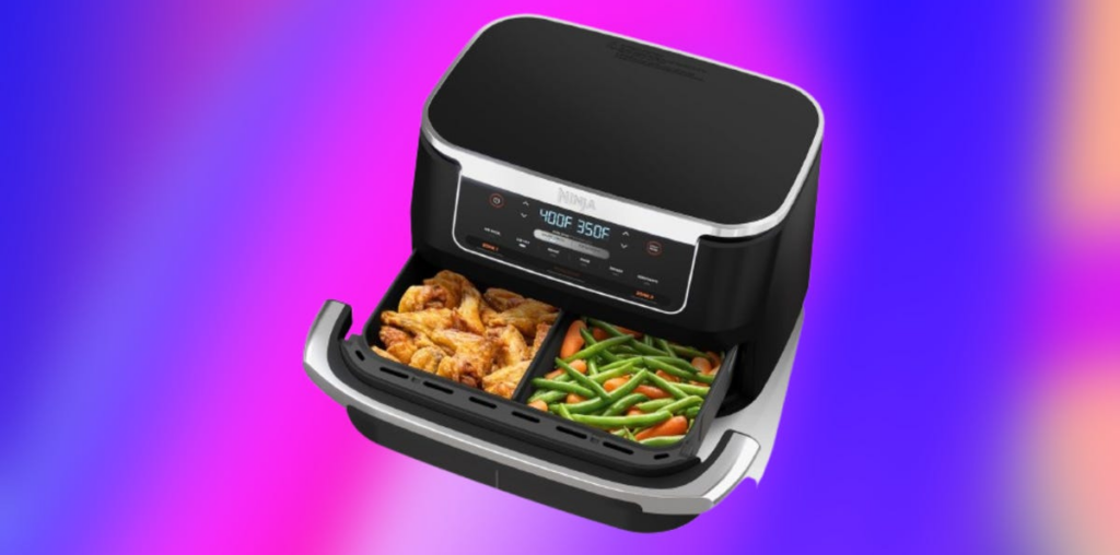 Black Ninja 8-quart air fryer against purple and pink gradient background.