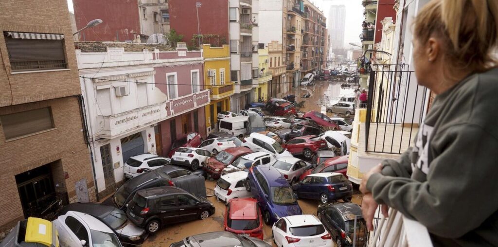 Spain declares three days of mourning as floods kill at least 64 people in Valencia region