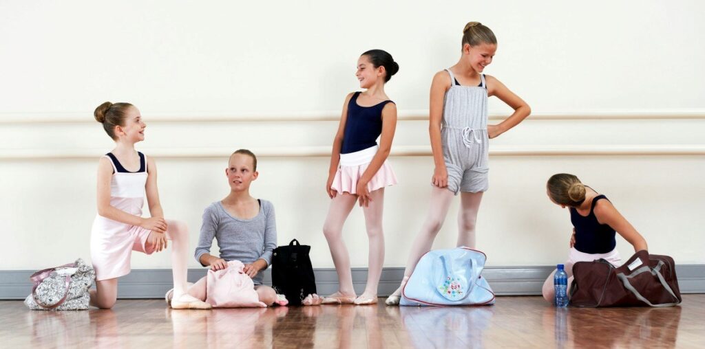 Step-mother won't drive 12 and 13-year-old step-daughters to dance class 50 minutes away, painting her as the villain, she wonders if she's wrong: 'Their mom's negativity changed how they treat me'