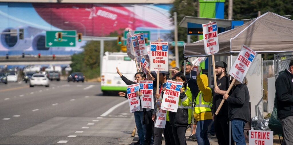 Striking Boeing workers make earnings day a cliffhanger for CEO