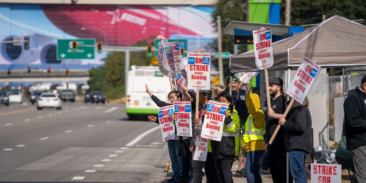 Striking Boeing workers make earnings day a cliffhanger for CEO