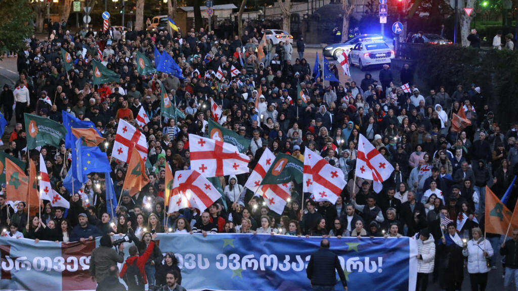 Tens of thousands of pro-EU supporters rally in Georgia ahead of key vote