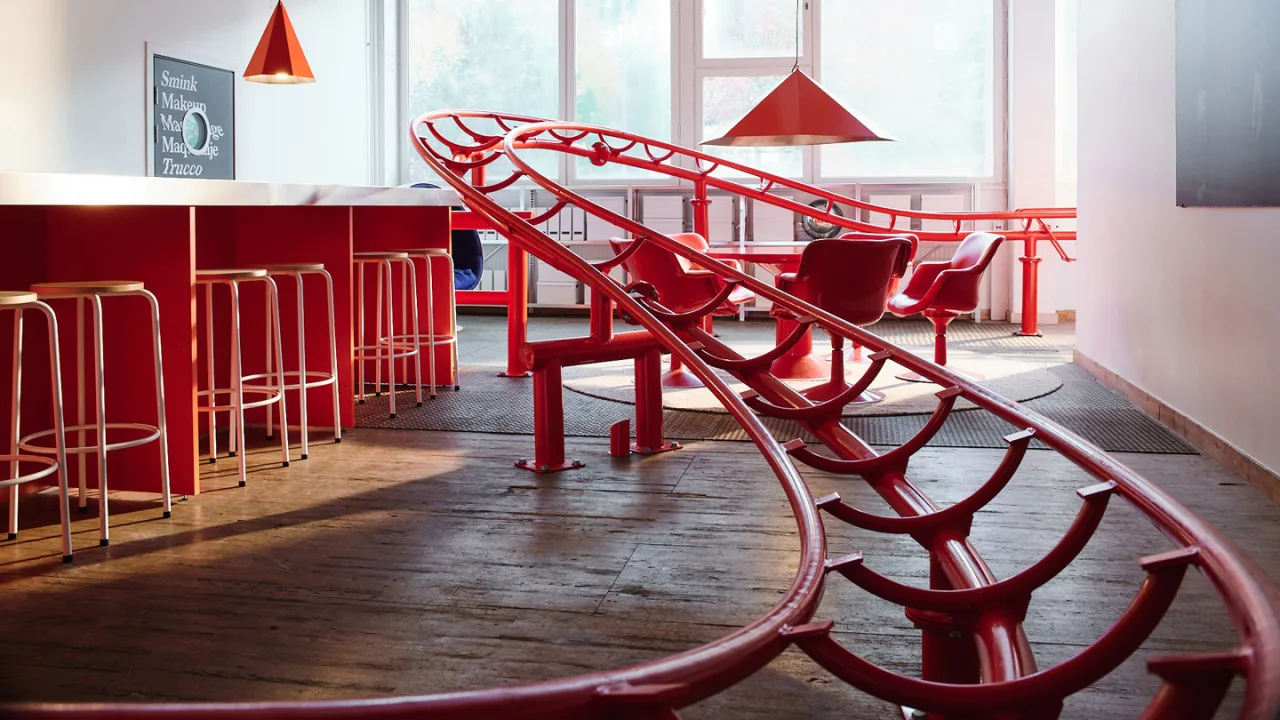 Think your office is fun? This Swedish studio has a fully-functioning indoor roller coaster