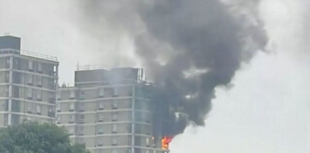 Tower block goes up in flames as 70 firefighters race to battle inferno