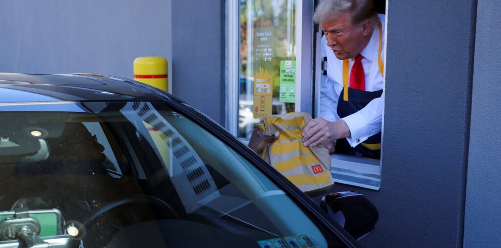 Trump works McDonald's drive-thru, Harris campaign scoffs at stunt