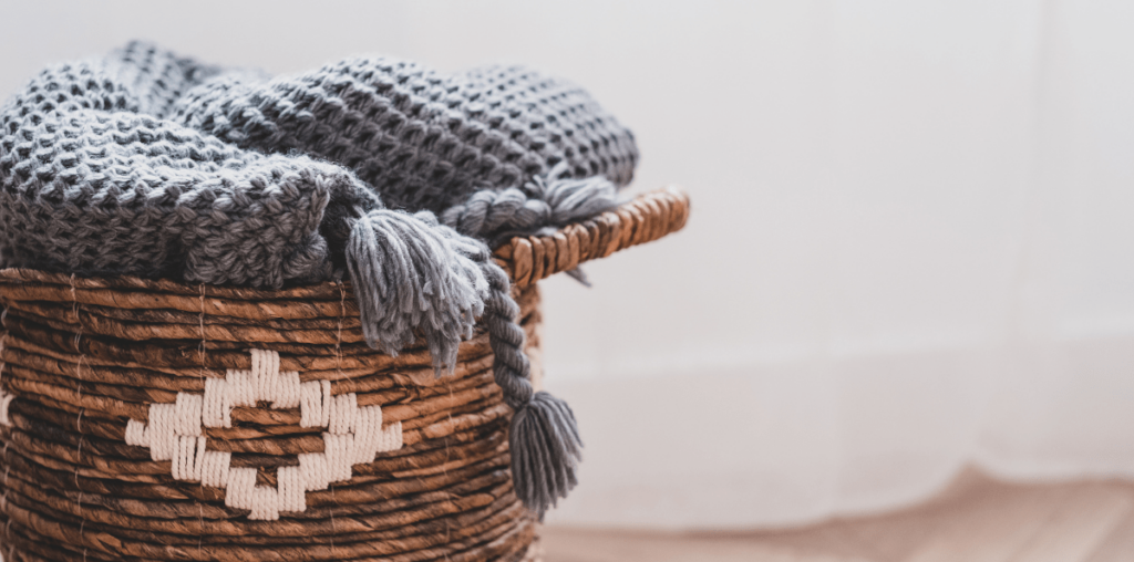 Blanket in a basket.