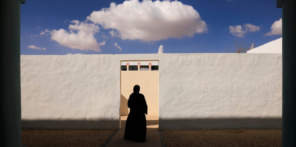 X architects revitalizes UAE heritage house as community center with operable louver skin