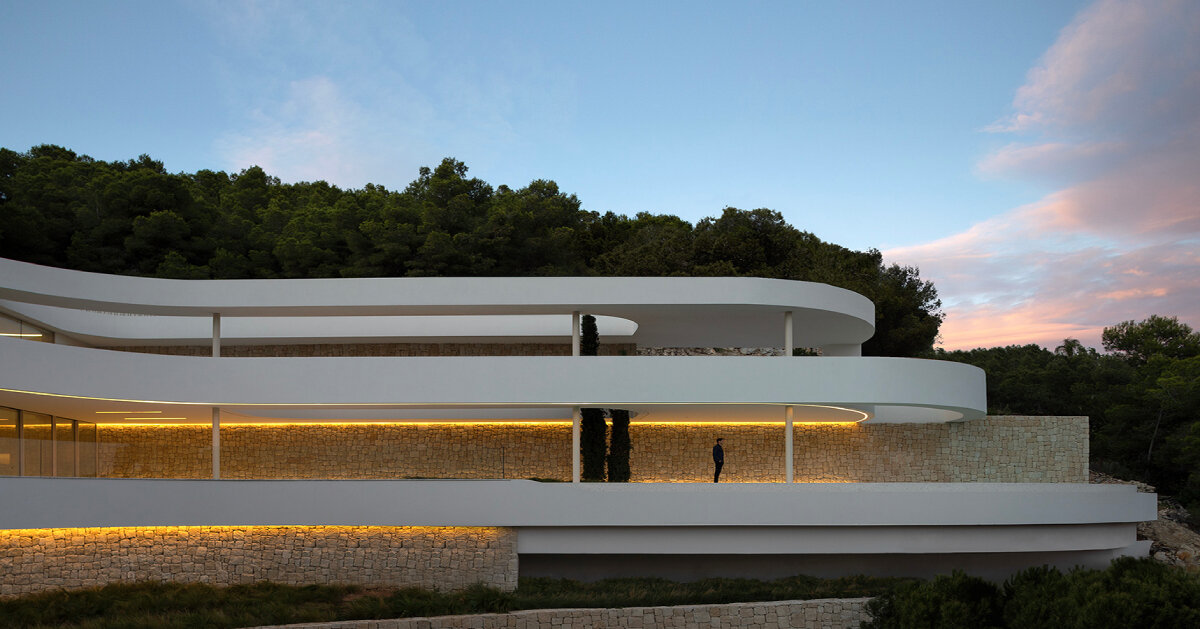 sinuous terraces wrap around pepe giner arquitectos’ hillside house in spain