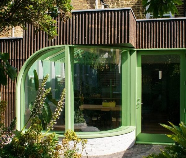 CAN relinks Verdant House with garden using statement green window