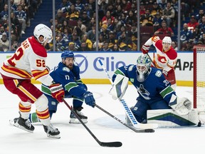 Canucks 3, Flames 1: J.T. Miller stirs drink for home-ice victory