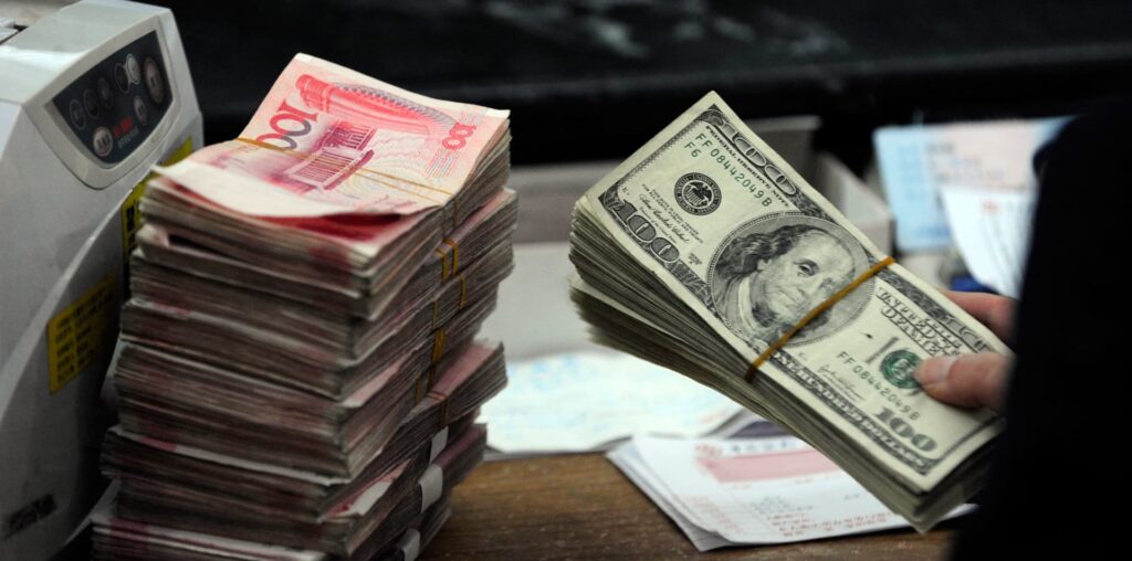 Chinese yuan to hit record lows as U.S. tariff threat mounts, investment banks forecast