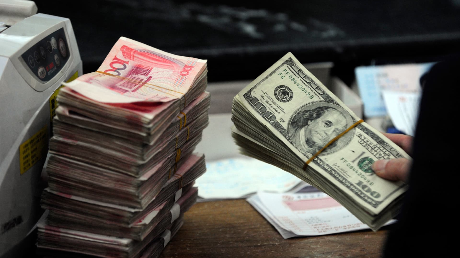 Chinese yuan to hit record lows as U.S. tariff threat mounts, investment banks forecast