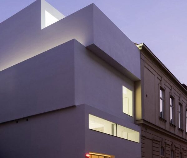 Dílna houses Brno art studios within a stack of white cubes