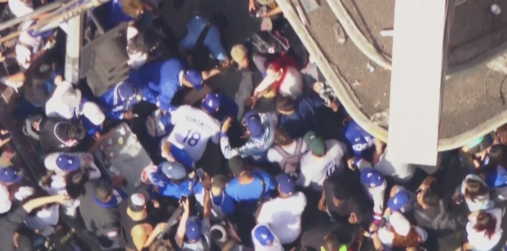 Dodgers fan who fell off roof during World Series celebration in critical condition, family says