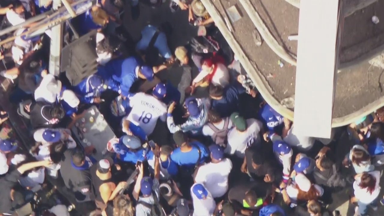 Dodgers fan who fell off roof during World Series celebration in critical condition, family says