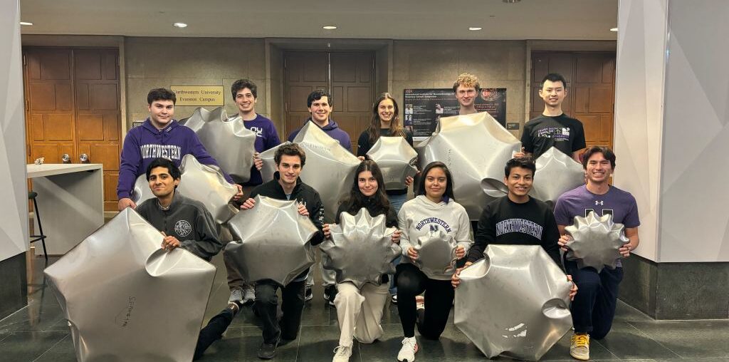 Northwestern University team members pose with lunar inflatable prototypes from their METALS project in NASA’s 2024 BIG Idea Challenge.