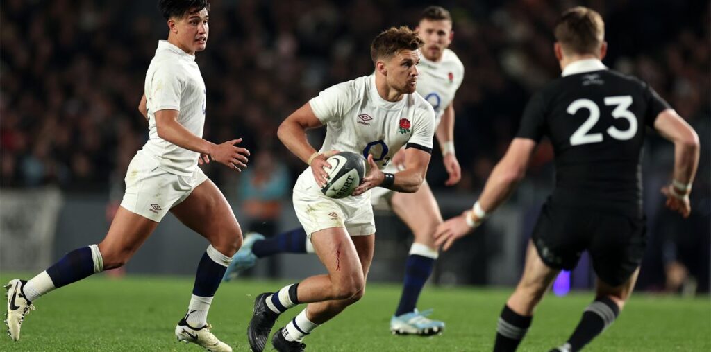 England's Henry Slade runs with the ball in the second test against New Zealand in July 2024.