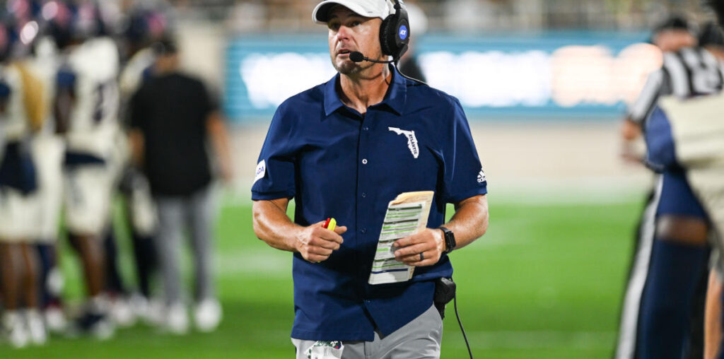 Florida Atlantic's Tom Herman irately confronts South Florida head coach Alex Golesh after 44-21 embarrassment