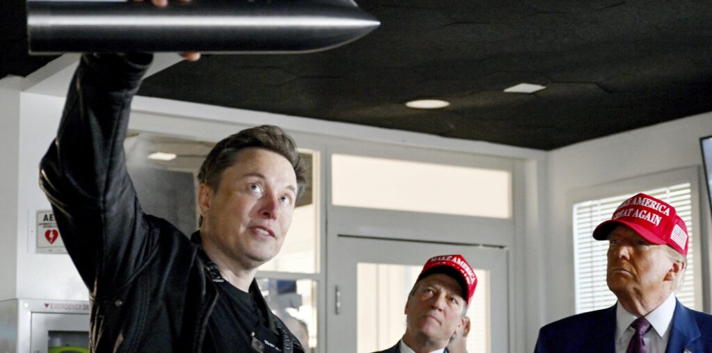 Elon Musk (L) with Donald Trump (R) (Image: AP/Brandon Bell)