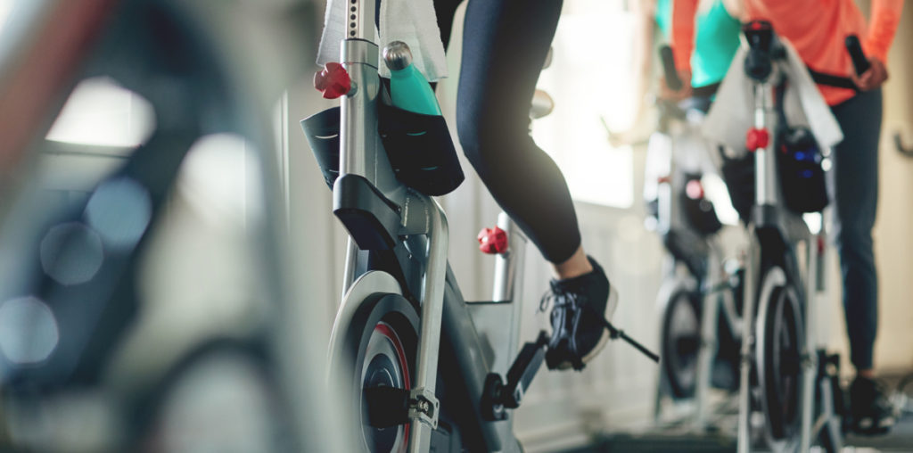 I'm a Spin Instructor, and These Are My Tips for Creating the Perfect Cardio Playlist