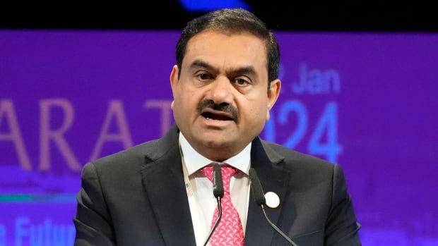 Indian billionaire Adani, three Canadian pension executives charged in major fraud scheme | CBC News