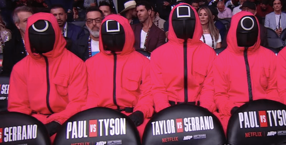 Jake Paul and Mike Tyson Fight Filled With Nonstop Netflix Promotion, From ‘Squid Game’ Guards to ‘America’s Sweethearts’ Cheerleaders